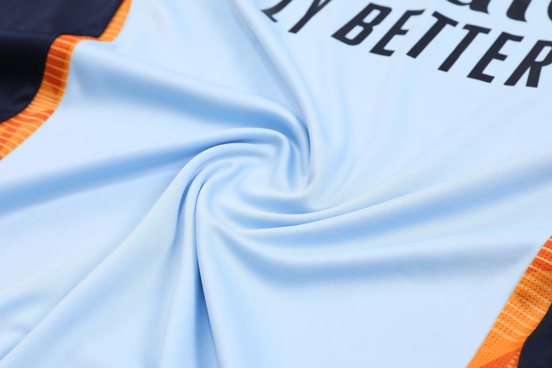 Real Madrid 2024/25 Training Kit - Light Blue/Orange