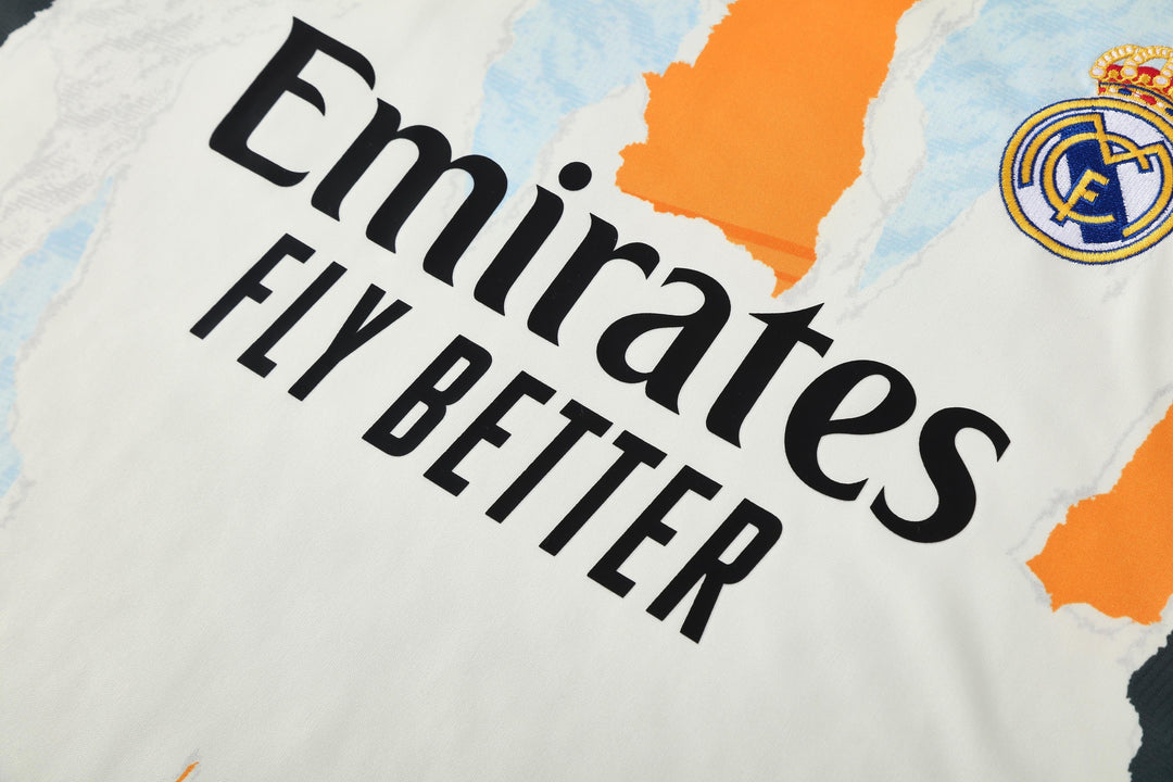 Real Madrid 2025/26 Training Shirt - Off-White/Orange